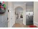 Inviting foyer featuring tile flooring, neutral walls, and an archway leading to the living area at 6015 Catalina Dr. # 132, North Myrtle Beach, SC 29582