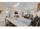 Bright and airy living space with comfortable leather seating and sliding door access to outdoor views at 6015 Catalina Dr. # 132, North Myrtle Beach, SC 29582