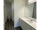 Well-lit bathroom with a spacious vanity and modern fixtures at 605 Muster Field Ct., Conway, SC 29526