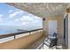 Ocean view from a balcony with two chairs and a railing overlooking the beach at 6100 N Ocean Blvd. # 804, North Myrtle Beach, SC 29582