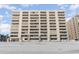 Beachfront condo building on the sand with multiple balconies and views of the ocean on a clear day at 6100 N Ocean Blvd. # 804, North Myrtle Beach, SC 29582