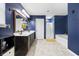 Bathroom with double sinks, a soaking tub, and glass enclosed shower at 650 Woodman Dr., Conway, SC 29526