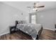Bedroom with ceiling fan and laminate flooring at 650 Woodman Dr., Conway, SC 29526