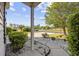 Inviting front yard with lush landscaping and a scenic view of the pond and fountain at 650 Woodman Dr., Conway, SC 29526
