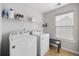 Laundry room with washer, dryer, and extra storage at 650 Woodman Dr., Conway, SC 29526