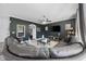 Spacious living room with dark accent wall, plush seating, and modern decor at 650 Woodman Dr., Conway, SC 29526