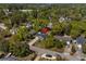 An aerial view shows this home nestled among trees in a residential neighborhood at 710 Yucca Ave., Myrtle Beach, SC 29577