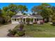 Charming one-story home featuring a well-manicured lawn and beautiful flowering landscape at 710 Yucca Ave., Myrtle Beach, SC 29577