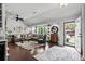 Bright living room showcasing a plush sectional sofa, lots of natural light, and hardwood floors at 710 Yucca Ave., Myrtle Beach, SC 29577