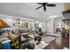 Cozy living room with ample seating, a large window, and hardwood floors throughout at 710 Yucca Ave., Myrtle Beach, SC 29577