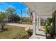 Welcoming front porch with classic white columns and a beautifully landscaped front yard at 710 Yucca Ave., Myrtle Beach, SC 29577