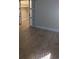 Bedroom featuring a walk-in closet with custom shelving and wood-look floors at 880 Briarwood Dr., Myrtle Beach, SC 29572