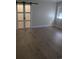 Bedroom featuring sliding closet doors and hardwood flooring at 880 Briarwood Dr., Myrtle Beach, SC 29572