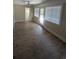 Comfortable room with new floors, lots of windows, and a walk-in closet at 880 Briarwood Dr., Myrtle Beach, SC 29572
