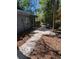 A gray house exterior with a view of a cement patio with a trashcan at 880 Briarwood Dr., Myrtle Beach, SC 29572