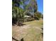 Spacious yard with lush lawn and mature trees surrounding the property at 880 Briarwood Dr., Myrtle Beach, SC 29572