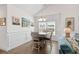 Cozy dining area with a modern chandelier and natural light at 948 Jackline Place # 201, Murrells Inlet, SC 29576