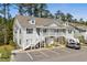 Well maintained two story condos offer convenient parking and beautifully landscaped grounds at 948 Jackline Place # 201, Murrells Inlet, SC 29576