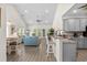 A bright and airy living space with seamless flow between the kitchen, dining, and living areas at 948 Jackline Place # 201, Murrells Inlet, SC 29576