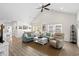 Open concept featuring hard wood floors, vaulted ceiling, and natural light at 948 Jackline Place # 201, Murrells Inlet, SC 29576