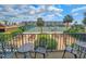 Balcony view of tennis courts, landscaping, and buildings at 9650 Shore Dr. # 810, Myrtle Beach, SC 29572