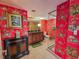 Unique bathroom with bold, tropical-themed wallpaper and a modern glass-enclosed shower at 9650 Shore Dr. # 810, Myrtle Beach, SC 29572