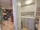 Bathroom featuring a glass shower, and patterned wallpaper, and laundry room at 9650 Shore Dr. # 810, Myrtle Beach, SC 29572