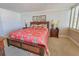 Comfortable bedroom featuring a large bed with floral pattern and neutral-toned walls at 9650 Shore Dr. # 810, Myrtle Beach, SC 29572
