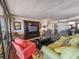 Comfortable living room featuring plush seating, a large TV, and stylish decor at 9650 Shore Dr. # 810, Myrtle Beach, SC 29572