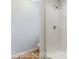 Clean bathroom showcasing a shower with white tiles, perfect for a refreshing experience at 993 Cherrystone Loop, Conway, SC 29526