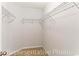 Functional walk-in closet with metal shelving, offering ample storage for clothes and accessories at 993 Cherrystone Loop, Conway, SC 29526