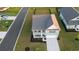 Aerial view of a lovely two-story home with a large front yard, showcasing its prime location at 101 Cowan Pl., Myrtle Beach, SC 29588