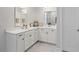 Bright bathroom featuring dual vanities with white countertops and modern fixtures at 101 Cowan Pl., Myrtle Beach, SC 29588