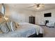 Bright bedroom with plush carpet, a ceiling fan, and an abundance of natural light at 101 Cowan Pl., Myrtle Beach, SC 29588