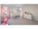 Charming bedroom featuring a unique house-shaped bed frame and playful decor at 101 Cowan Pl., Myrtle Beach, SC 29588