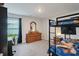 Cozy bedroom featuring a bunk bed, dresser and window with serene outdoor view at 101 Cowan Pl., Myrtle Beach, SC 29588