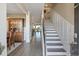 Welcoming foyer with hardwood floors and staircase at 101 Cowan Pl., Myrtle Beach, SC 29588