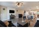 Open-concept living space featuring living room, kitchen, and dining area with stylish furnishings at 101 Cowan Pl., Myrtle Beach, SC 29588