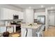Modern kitchen with granite countertops, stainless steel appliances, and white cabinetry at 1213 American Shad Dr. # 37, Conway, SC 29526