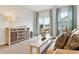 Stylish living room with access to an outdoor deck offering additional living space at 1213 American Shad Dr. # 37, Conway, SC 29526