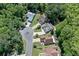 Aerial view of homes nestled within a lush, green, tree-lined neighborhood at 1516 Saint George Ln., Myrtle Beach, SC 29588