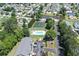 Aerial shot of a community pool, pond, and surrounding neighborhood with lush greenery and manicured lawns at 1516 Saint George Ln., Myrtle Beach, SC 29588