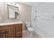 Bathroom features modern vanity, toilet, and walk-in shower with white subway tile surround at 1516 Saint George Ln., Myrtle Beach, SC 29588