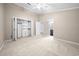 Bedroom features carpet, large closet with organizers, and door leading to ensuite bathroom at 1516 Saint George Ln., Myrtle Beach, SC 29588