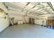 A well-organized garage provides ample space and storage with shelves, laundry, refrigerator and work area at 1516 Saint George Ln., Myrtle Beach, SC 29588