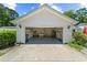 Spacious two-car garage interior showing ample storage, laundry area, and a clean, well-lit space at 1516 Saint George Ln., Myrtle Beach, SC 29588