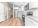 Renovated kitchen with stainless appliances, subway tile backsplash and abundant white cabinets at 1516 Saint George Ln., Myrtle Beach, SC 29588