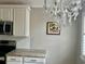 This kitchen shows granite countertops, stainless steel appliances, and decorative lighting at 1516 Saint George Ln., Myrtle Beach, SC 29588