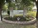 Entrance sign for Island Green South, a private community with lush landscaping at 1516 Saint George Ln., Myrtle Beach, SC 29588
