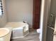 Bathroom featuring soaking tub, standing shower, and built in cabinet at 212 Weyburn St., Myrtle Beach, SC 29579